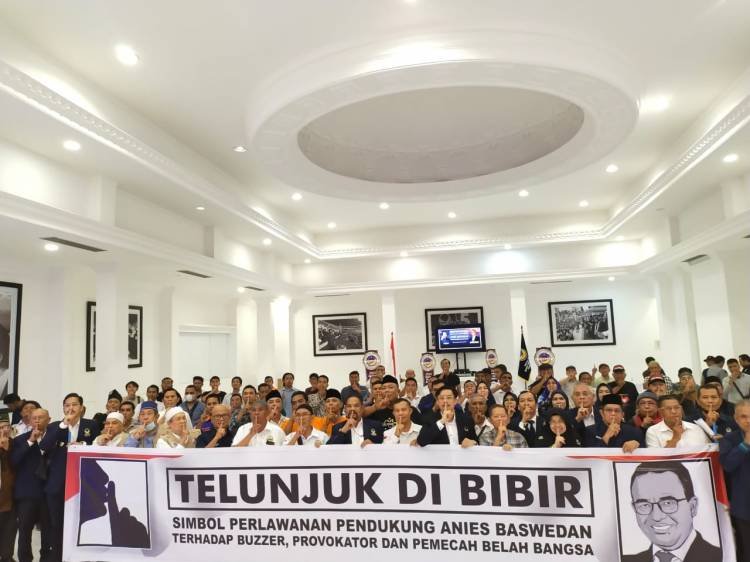 Hadapi Buzzer, Relawan Anies Melawan Dengan Simbol Telunjuk di Bibir