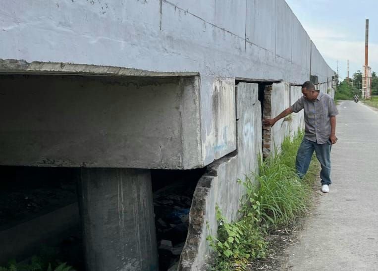 Tembok Fly Over Kualanamu Dirusak OTK, Warga Khawatir Jadi Sarang Narkoba dan Begal